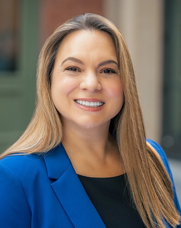 Headshot of Karina Lambertini of PTC Therapeutics' Patient Engagement Team